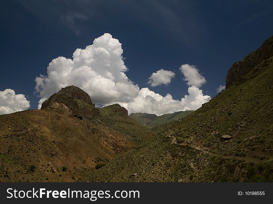 Landscape picture with rocks and clouds