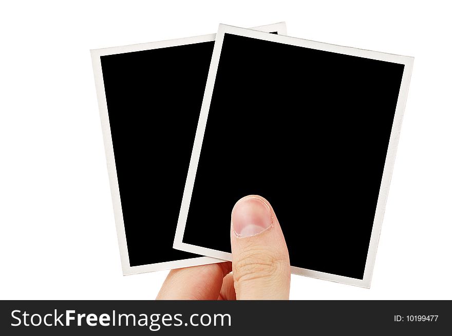 Hand holding blank photos on the white background