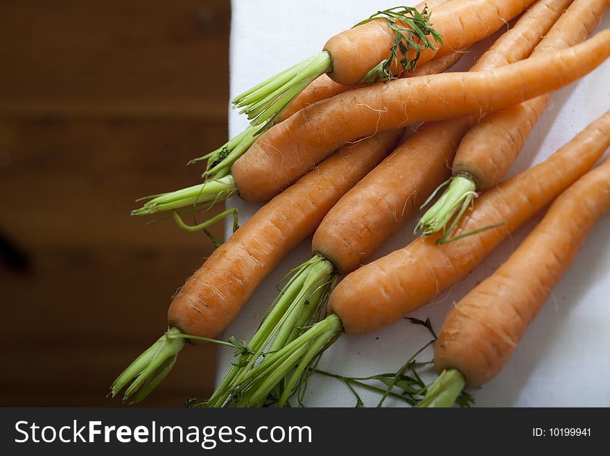 A bunch of fresh harvested carrots. A bunch of fresh harvested carrots