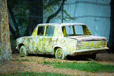 An Old Rusty Car In Paint From Paintball. Stock Photo