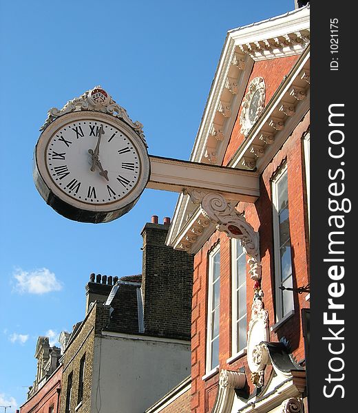 Georgian clock stituated in rochester high street. Georgian clock stituated in rochester high street