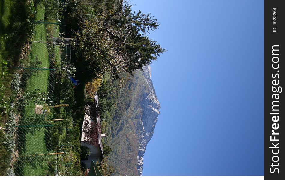 Mountain and garden with a clear blue sky. Mountain and garden with a clear blue sky.