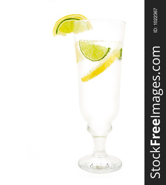 Glass of 7up with lemon and lime isolated on white background