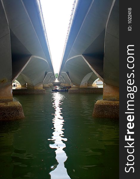 Boat under bridge in singapour