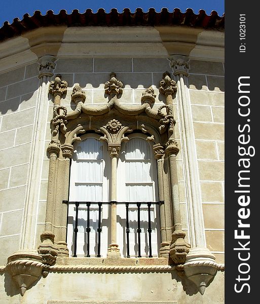 window in a typical street of the city of Évora, which is considered património of the humanity for UNESCO. window in a typical street of the city of Évora, which is considered património of the humanity for UNESCO.