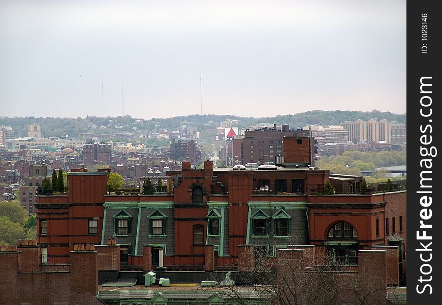 Upper stories of an old brownstone building on beacon street in boston massachusetts. Upper stories of an old brownstone building on beacon street in boston massachusetts