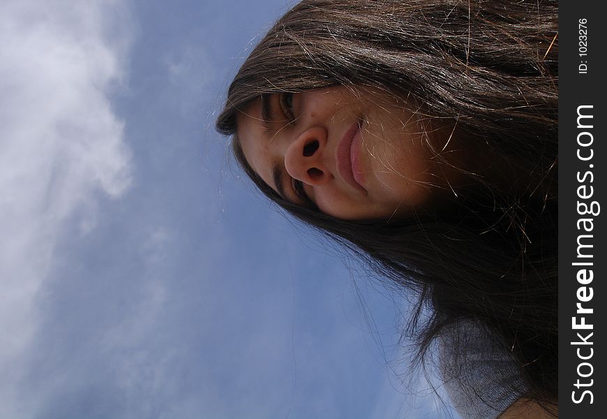 Looking up at the sky and a girl.