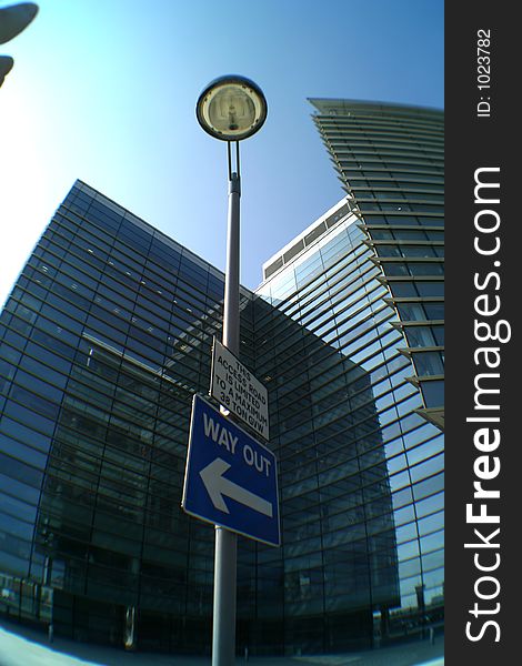 Steel and glass office block, with one sign, Leeds, West Yorkshire, England. Steel and glass office block, with one sign, Leeds, West Yorkshire, England