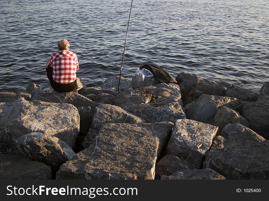Turkish man fishing on the Marmare Sea