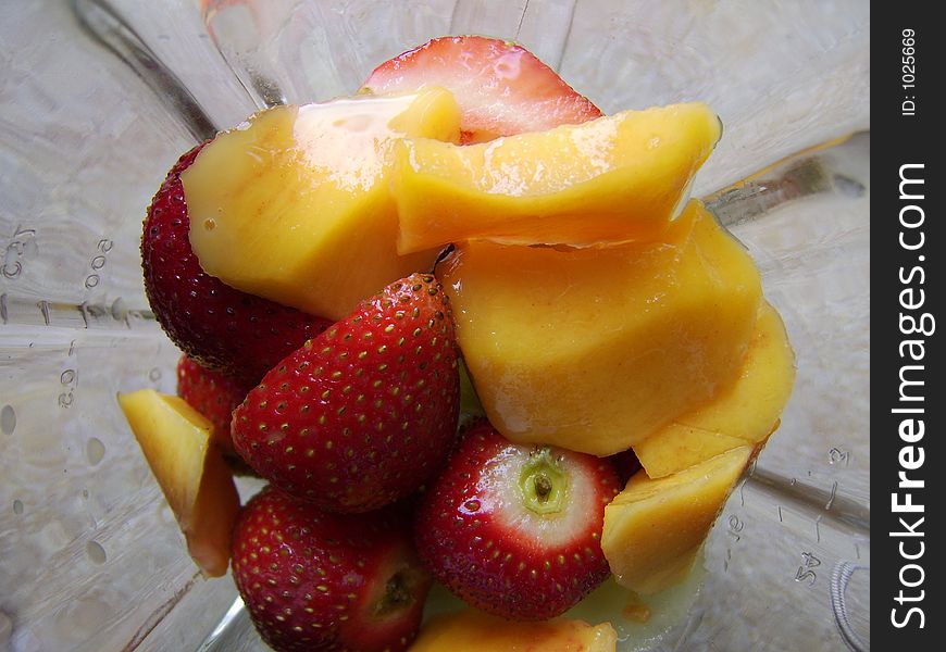 Close-up of fruit in a blender. Close-up of fruit in a blender