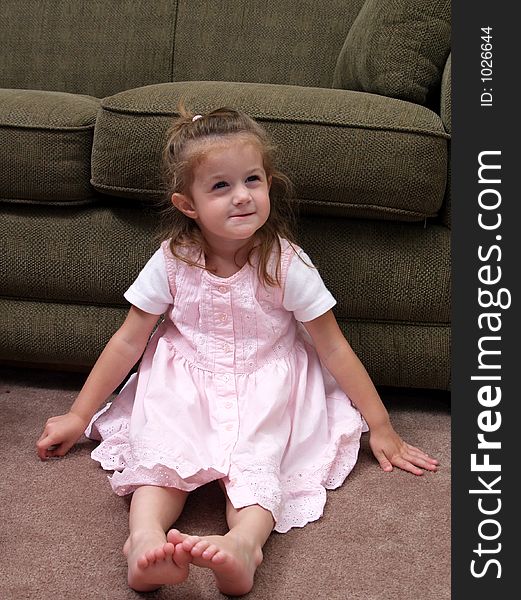 This little girl does not look happy about being put in time out. This little girl does not look happy about being put in time out.