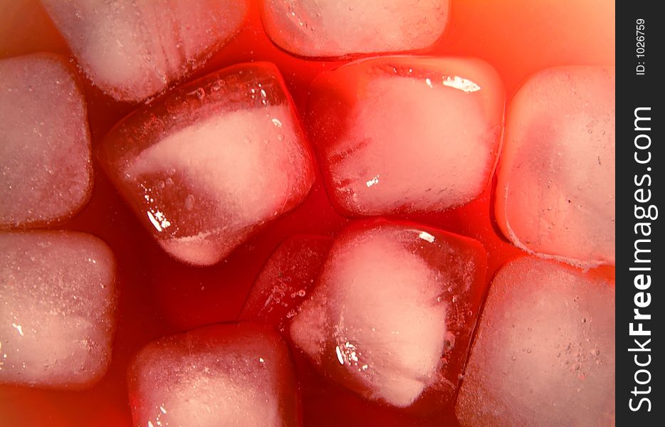 Ice cube in a red drink