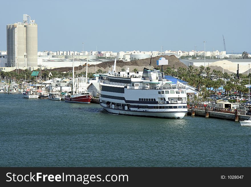 Florida port with fishing boats and cruise ship. Florida port with fishing boats and cruise ship