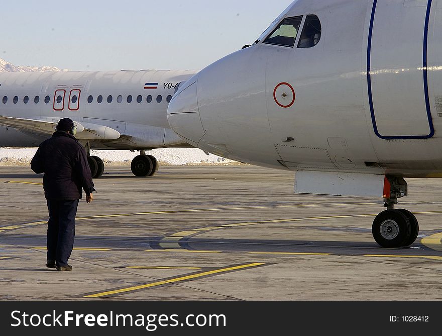 Plane at the airport, checking before the trip,. Plane at the airport, checking before the trip,