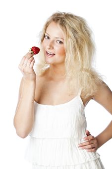 Young Woman In White Dress Eating Strawberries Royalty Free Stock Photography Young Woman In White Dress Eating Strawberries Royalty Free Stock Photography