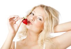 Young Woman In White Dress Eating Strawberries Stock Photography Young Woman In White Dress Eating Strawberries Stock Photography