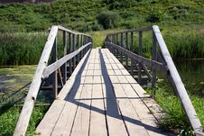 The Bridge Through The River On A Background Of A Stock Photo The Bridge Through The River On A Background Of A Stock Photo