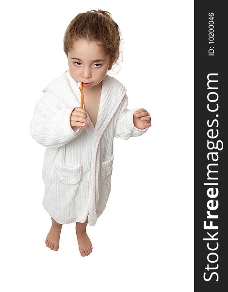 Girl brushing her teeth with toothbrush