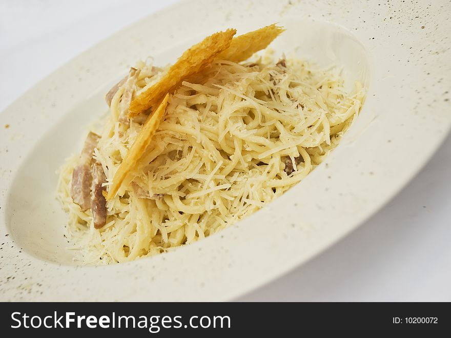 Close up of a plate with spaghetti alla carbonara with ham and parmesan,see more in <a href=http://www.dreamstime.com/restaurant-food-rcollection10721-resi828293>Restaurant food</a>
