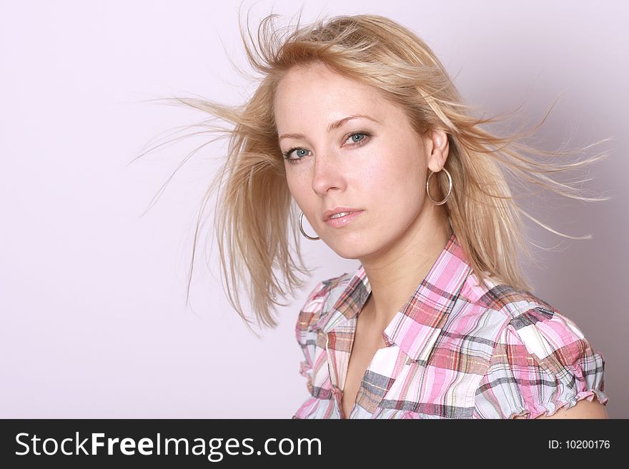 Happy blonde woman over background. Happy blonde woman over background