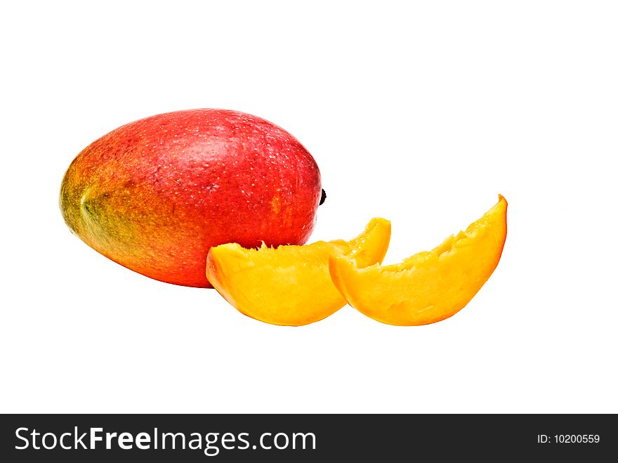 Mango and two segments isolated on white background