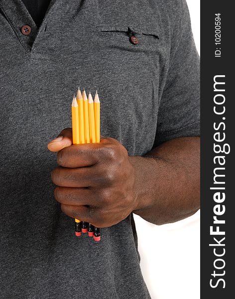 This is an image of a student holding a set of pencils.