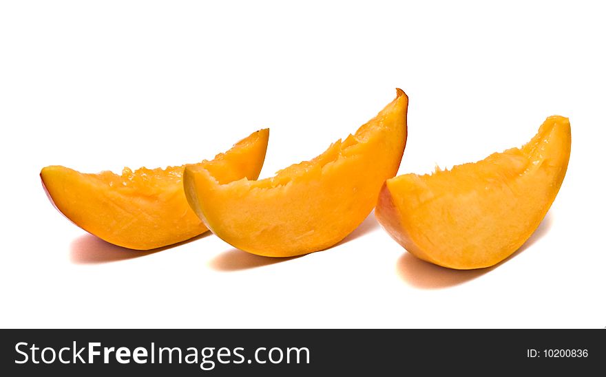 Mango and segments isolated on white background