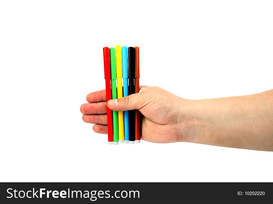 Man holds colour felt-tip pens in a hand