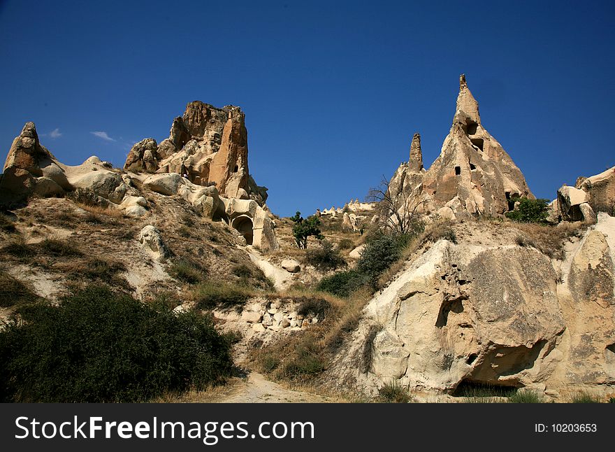 Bizarre sandstone formations near Goreme, Cappadocia, Turkey. Bizarre sandstone formations near Goreme, Cappadocia, Turkey