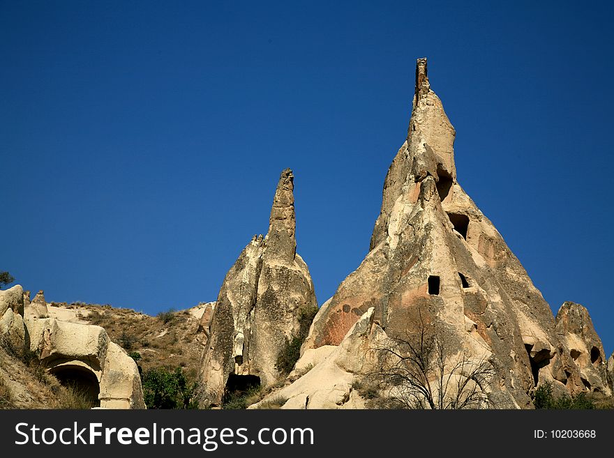 Bizarre sandstone formations near Goreme, Cappadocia, Turkey. Bizarre sandstone formations near Goreme, Cappadocia, Turkey