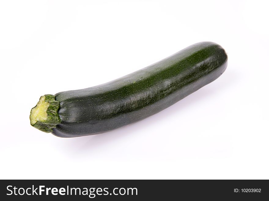 One fresh marrows on a white background. One fresh marrows on a white background.