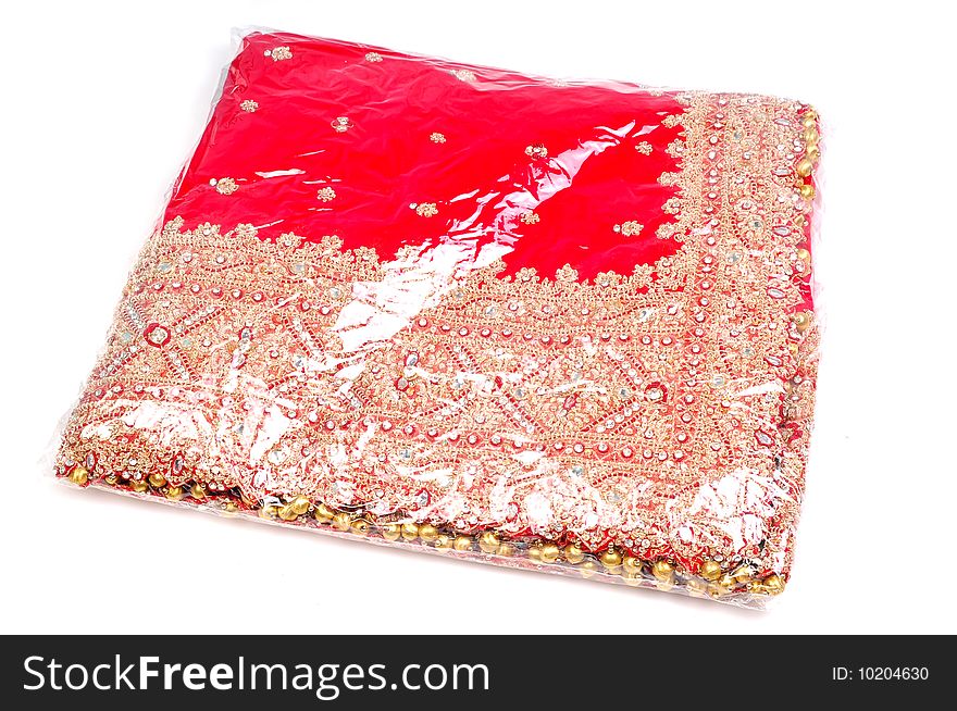 Packed bridal lehnga isolated on white background.