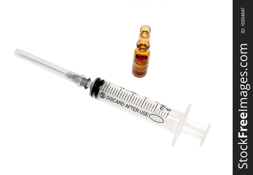 Syringe and drug ampula on white background. Syringe and drug ampula on white background.