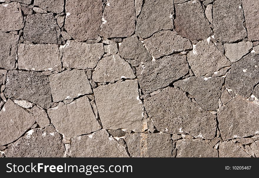 Old stone wall without cement