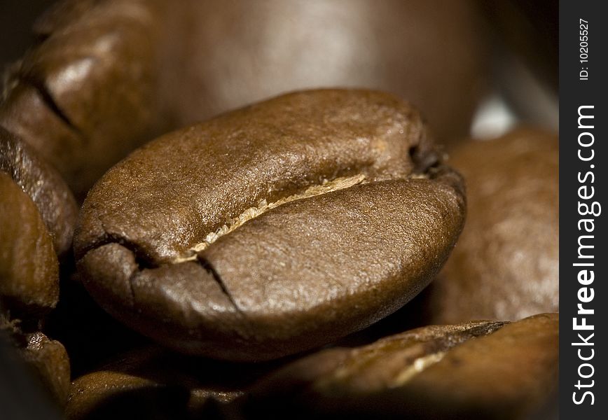 Roasted coffee beans, close-up. Macro.