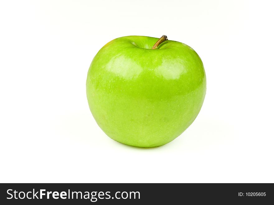 A green apple, isolated on a white background