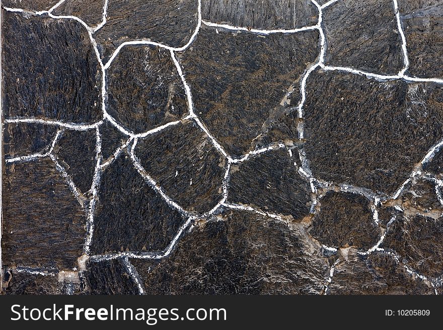 Old stone wall with white lines