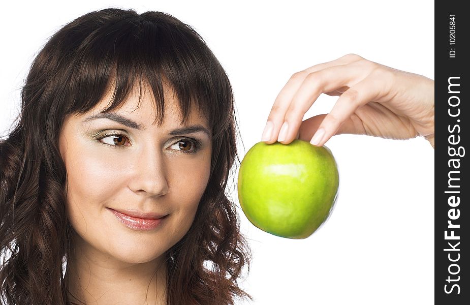 Portrait of young pretty woman with apple