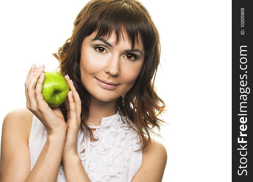 Portrait of young pretty woman with apple