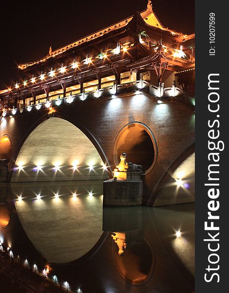 Ancient Chinese Bridge Sparkling at Night