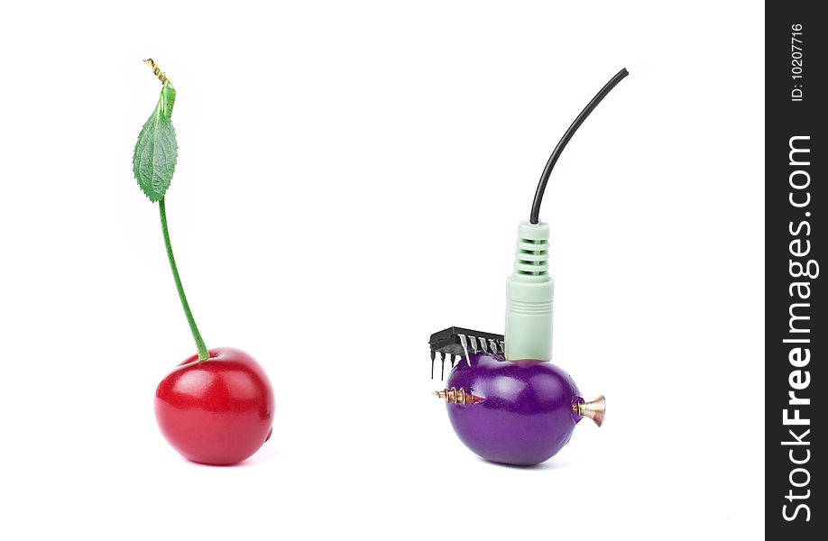 Genetically modified food concept - cherries with some hardware modifications. Genetically modified food concept - cherries with some hardware modifications