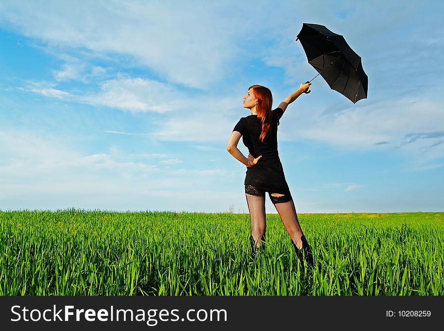 Business-kontsept on the nature with an umbrella