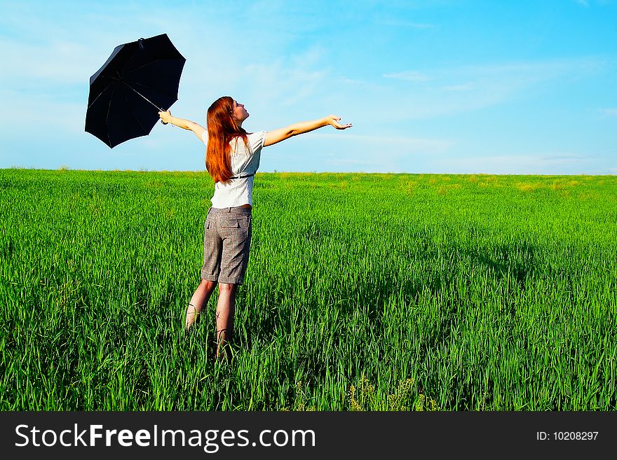 Business-kontsept on the nature with an umbrella