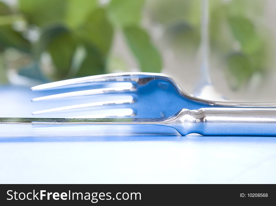 Knife And Fork Up Close - Teal Reflections