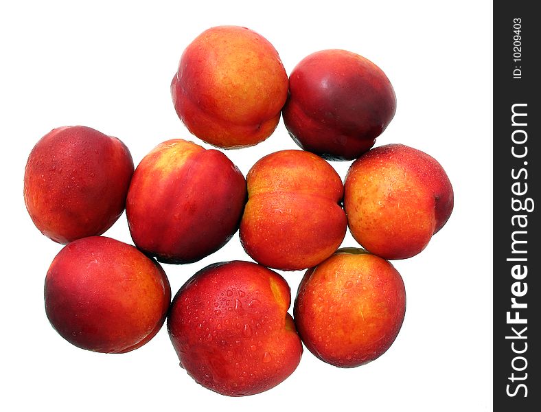 Fresh nectarines covered with droplets