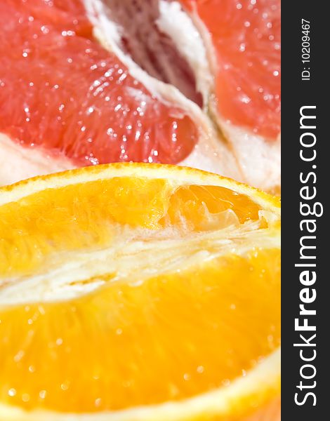 Fresh grapefruit and orange - background