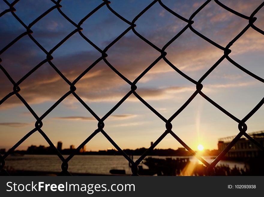 Behind the barrier