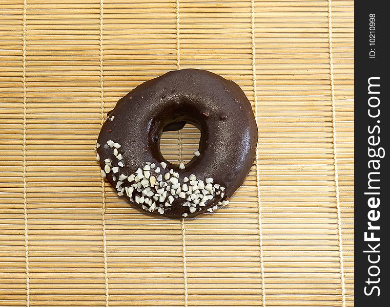 Isolate chocolate Donuts on Bamboo mat