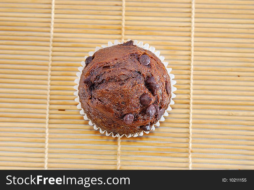 Isolated chocolate chips Coffee baked muffin. Isolated chocolate chips Coffee baked muffin