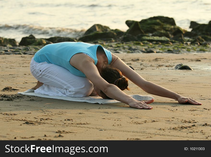 Yoga Exercises On Sand